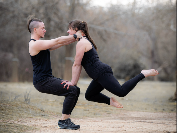 Sirus holding Becky Miller in a neck-supported counterbalance.